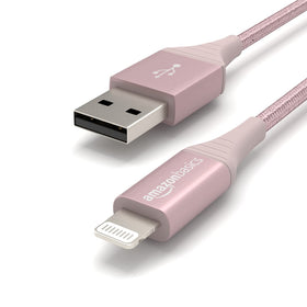 Amazon Basics rose gold cable in hand, showcasing 6ft length for flexible charging setup.