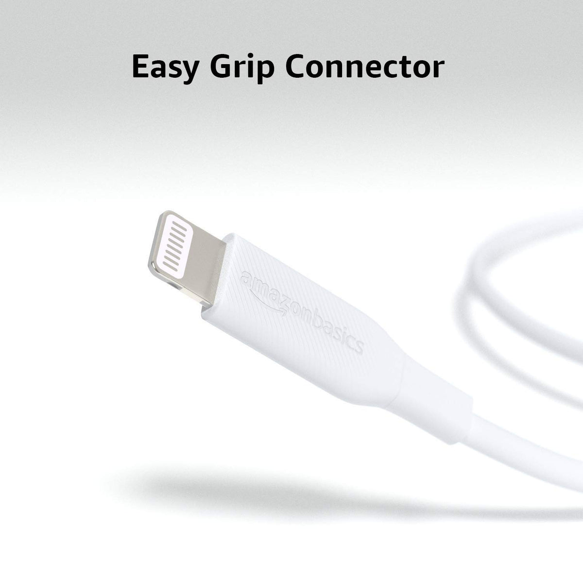 Amazon Basics 6 ft white cable shown beside iPad and MacBook.