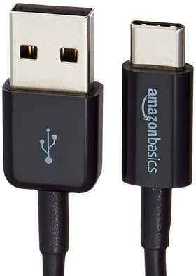 Amazon Basics black USB-C to USB-A 2.0 cable shown in a desk setup.