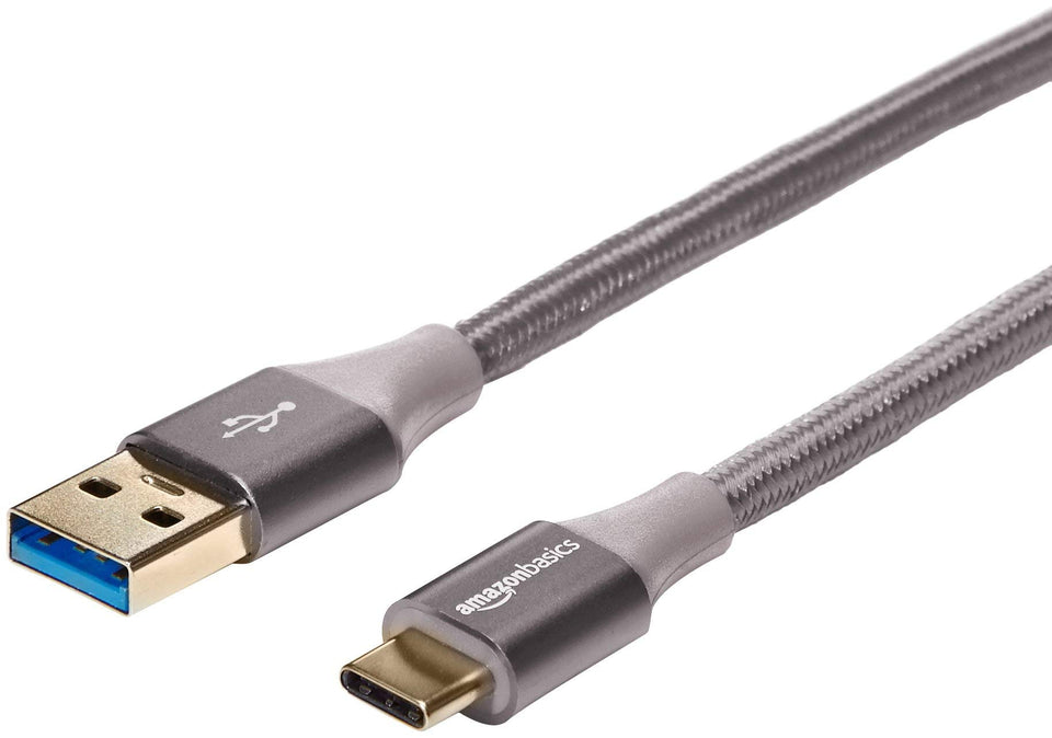 Amazon Basics USB-C to USB-A 3.1 Gen 1 cable, 10 ft, dark gray, for fast charging and syncing.