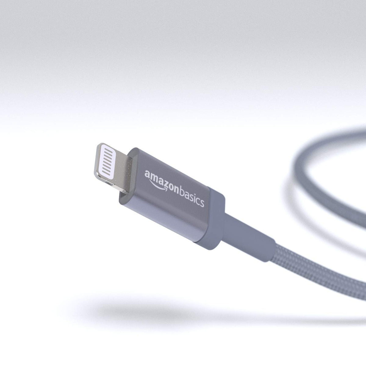 Amazon Basics USB-C to Lightning cable shown in the box for easy setup.
