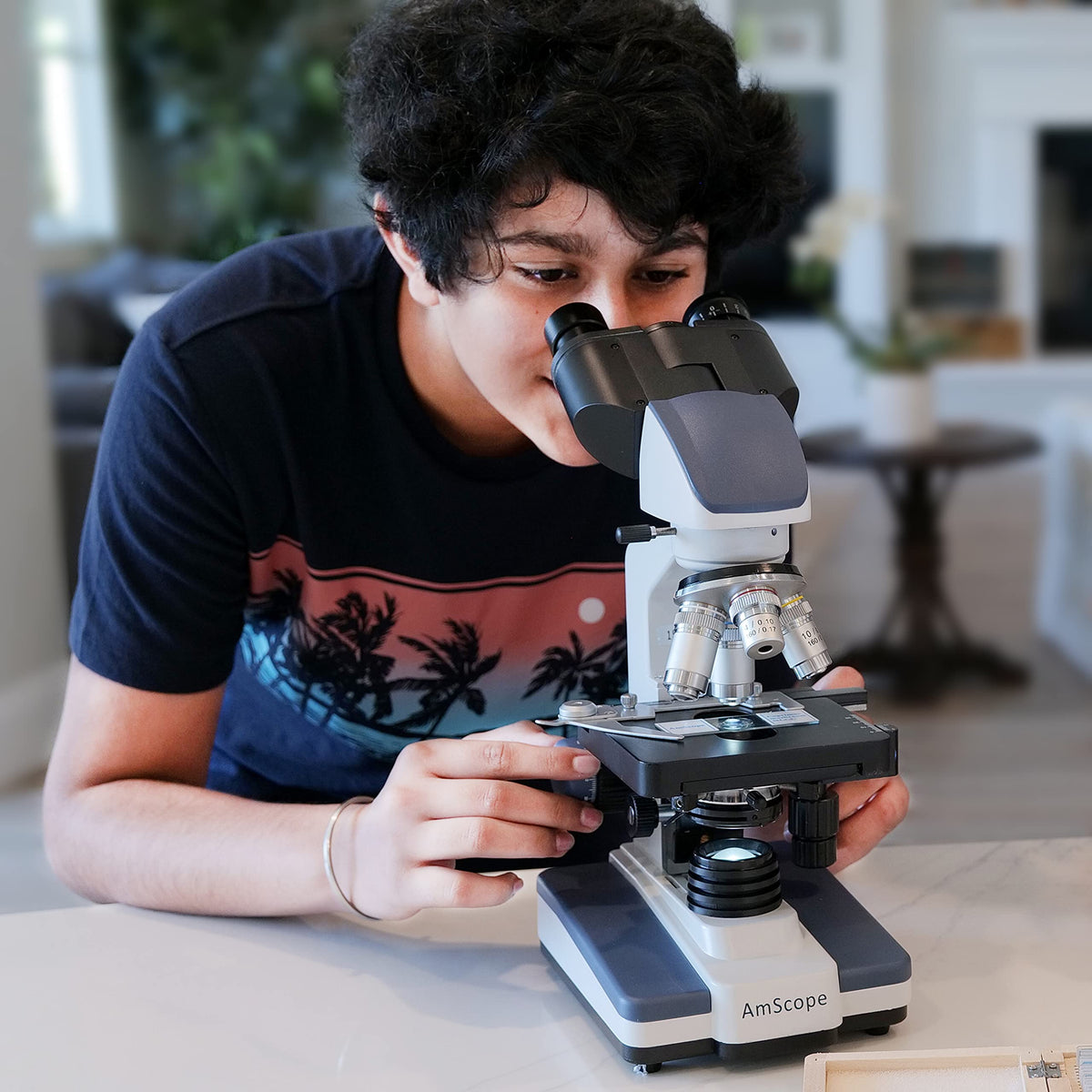 AmScope B120 tweezers assist careful sample handling.