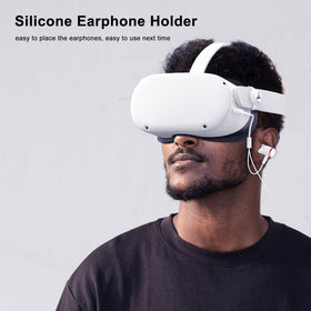 Person wearing AMVR earbuds during VR play showing immersive audio benefit