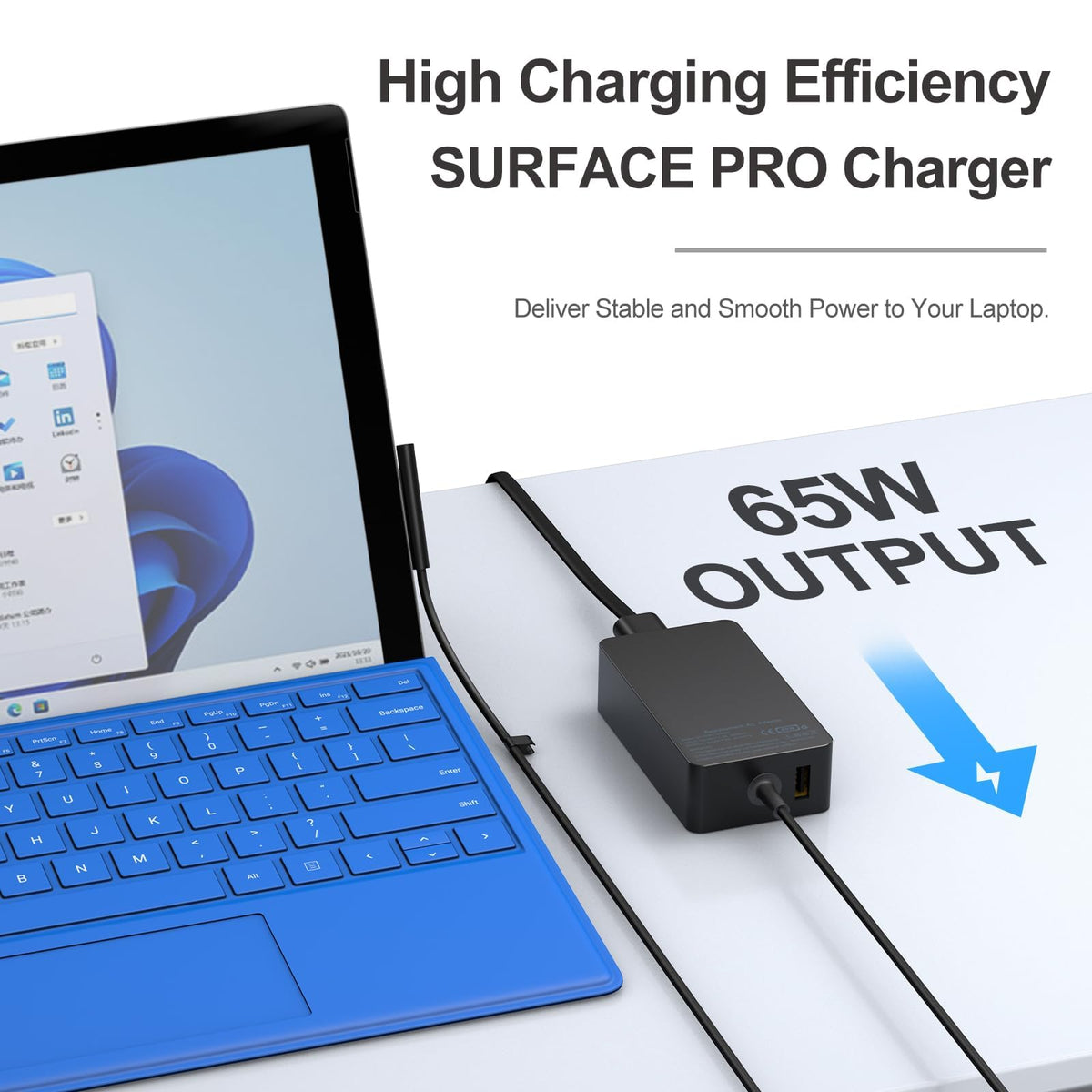 Andingker 65W charger USB port active powering a phone while Surface charges