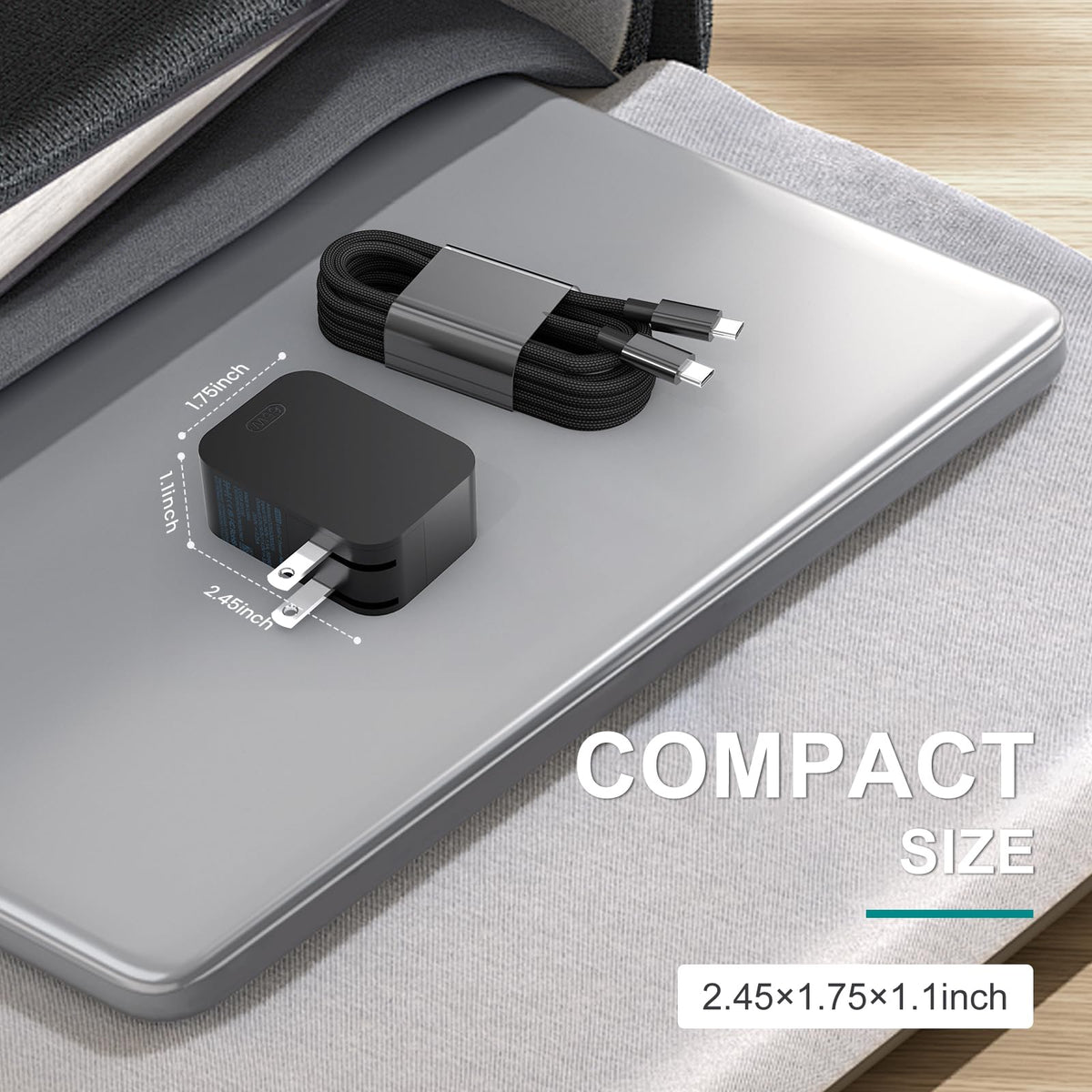 Andingker charger in a travel bag beside laptop showing travel convenience and global use benefit
