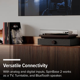 Andover Audio Spinbase 2 sits atop a turntable for space-saving setup.