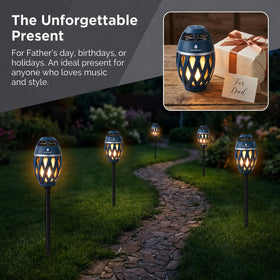 ANERIMST on a patio at dusk showing music and lantern ambiance benefit