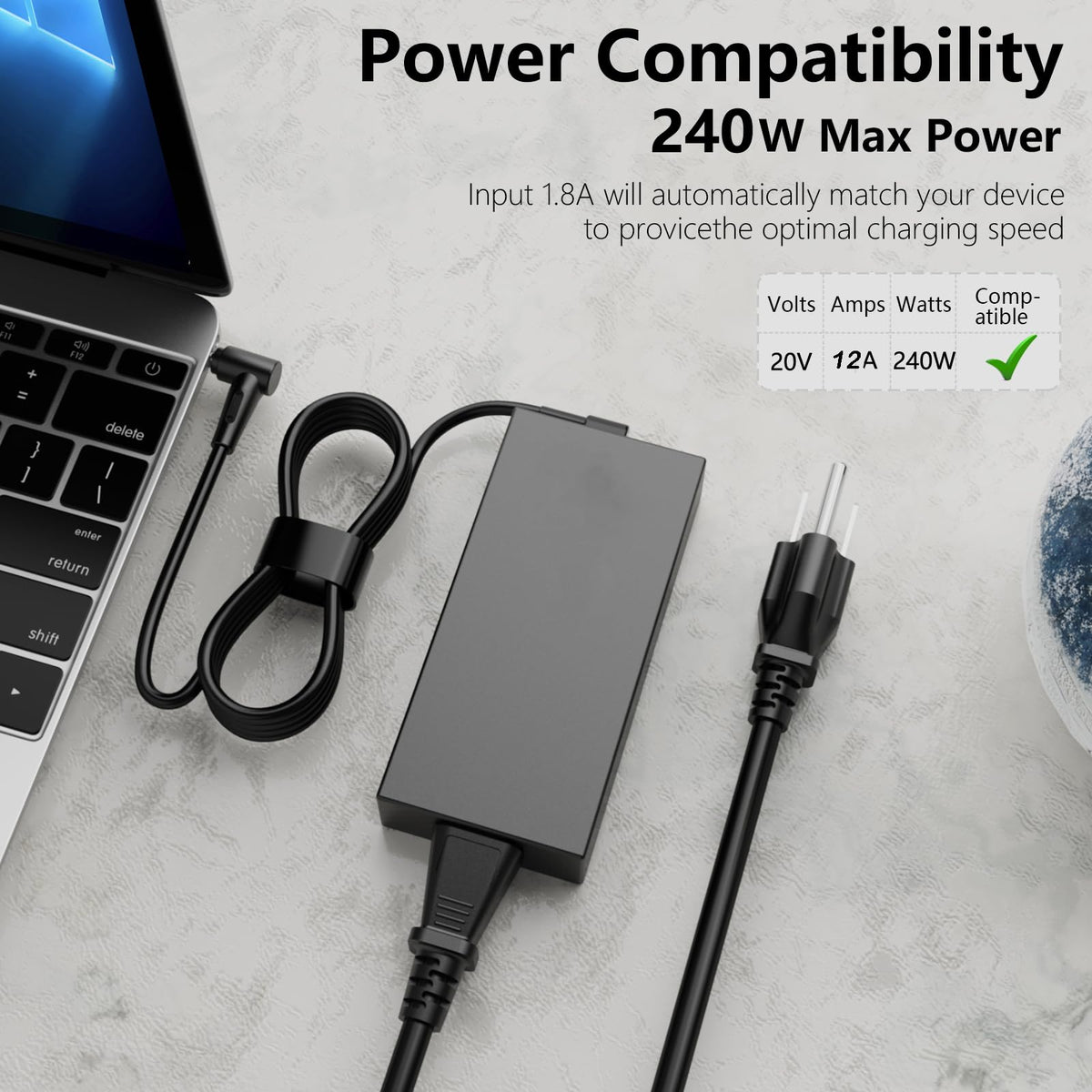 ANFRLE size scale next to laptop showing compact footprint and easy portability