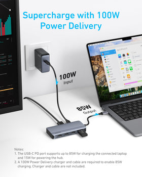 Anker hub with power cable, showing charging passthrough to laptop for uninterrupted work