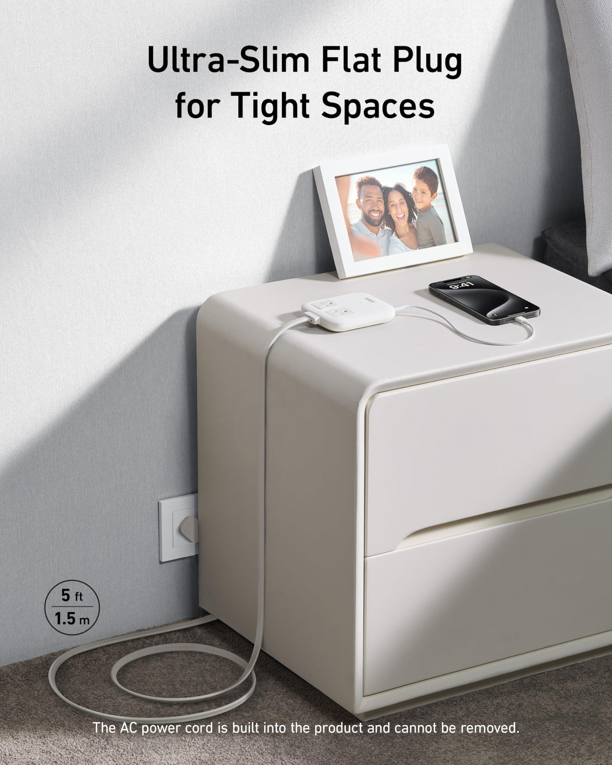 Anker beside an iPhone to show compact scale and easy portability