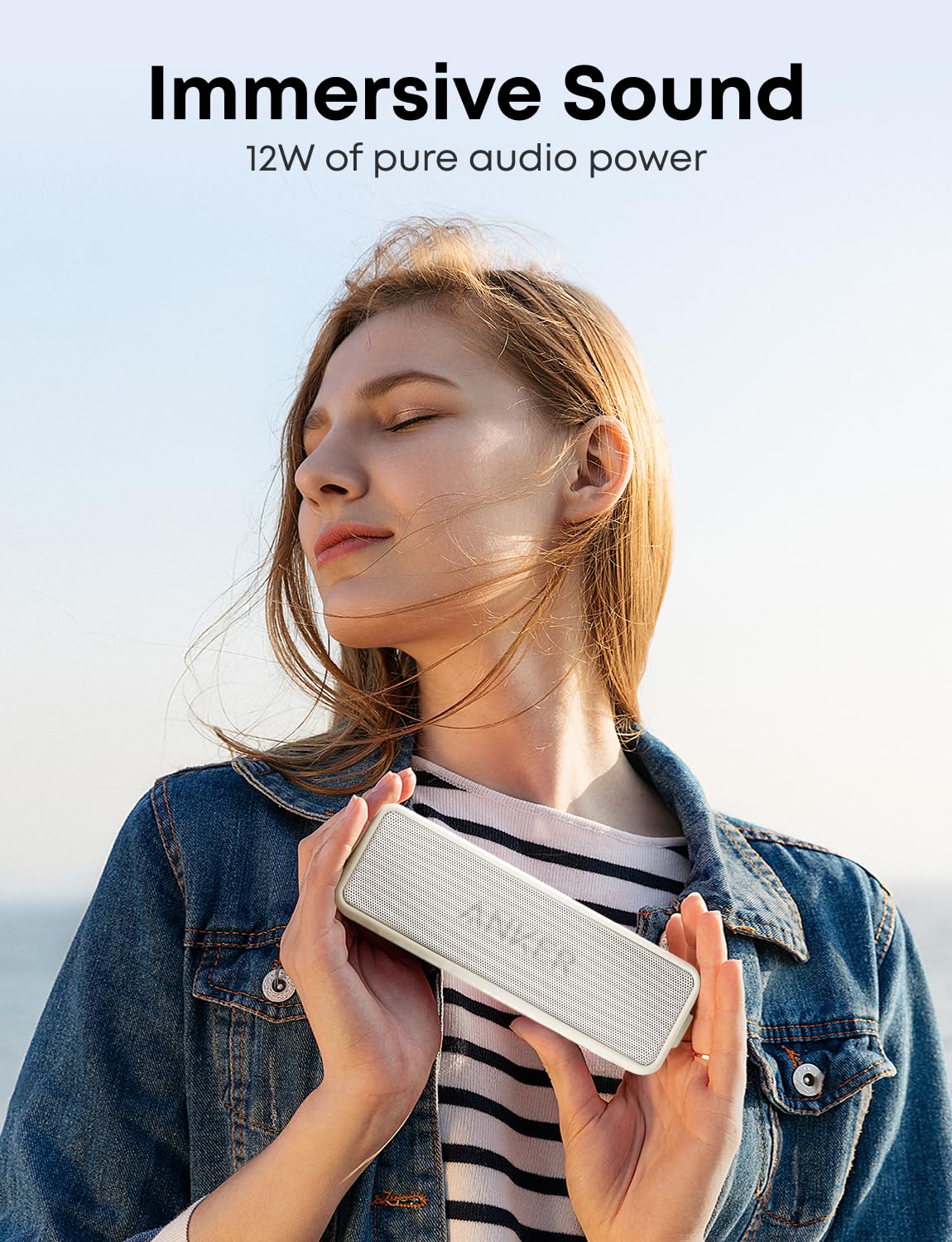 Anker Soundcore 2 held in hand to show compact size and easy portability benefit