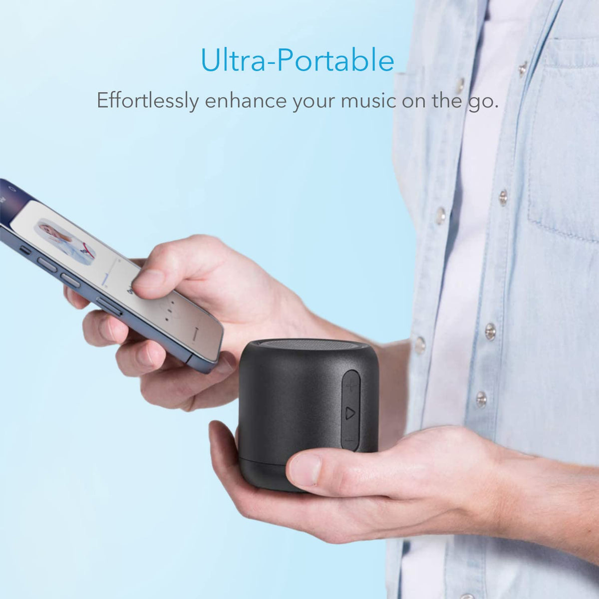 Anker Soundcore Mini top controls close-up showing buttons for easy playback and radio tuning