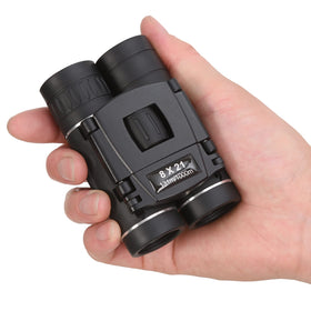 Anourney 8x21 mini pocket binoculars folded compact design for easy carrying.