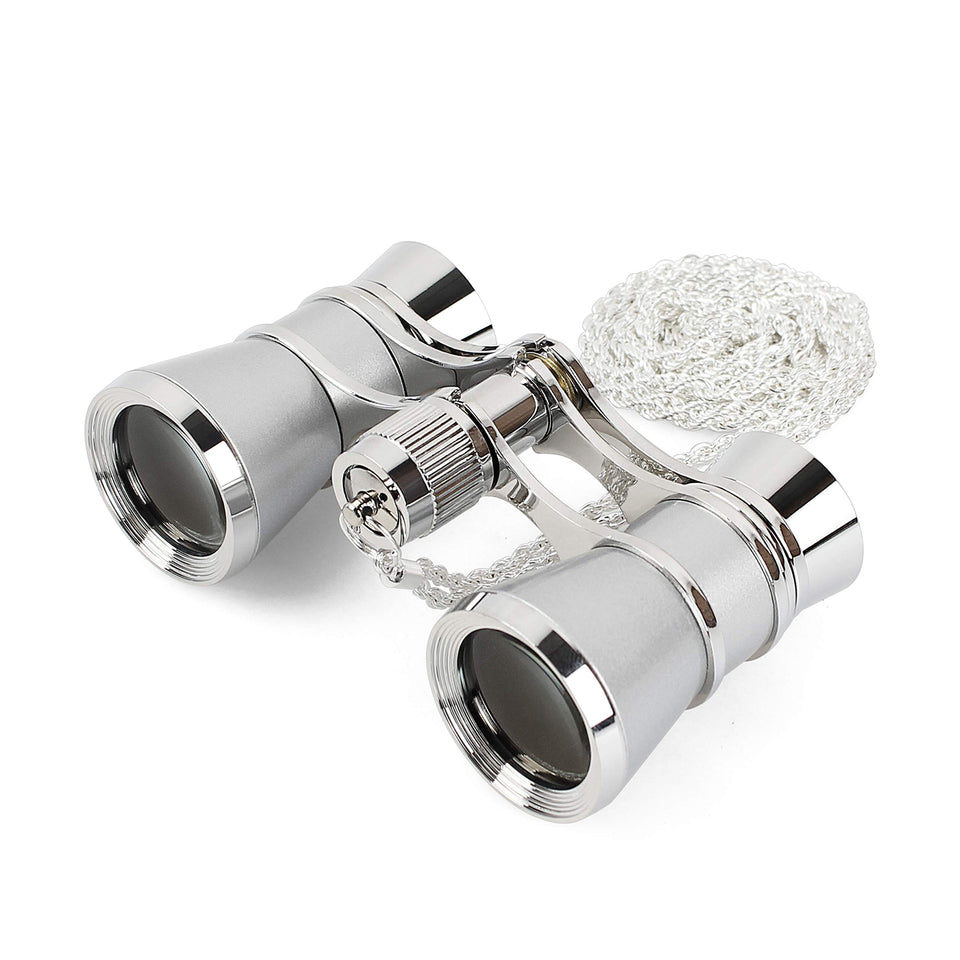 Aomekie opera glasses in silver with chain for stylish theater viewing.
