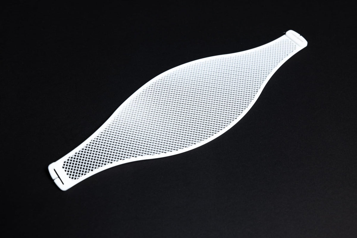 Close-up of the Apos Capra TPU mesh suspension highlighting soft, resilient material.