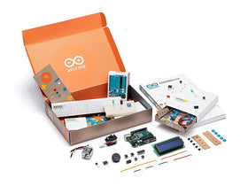 Arduino Official Starter Kit components spread showcases genuine parts for creative electronics projects.