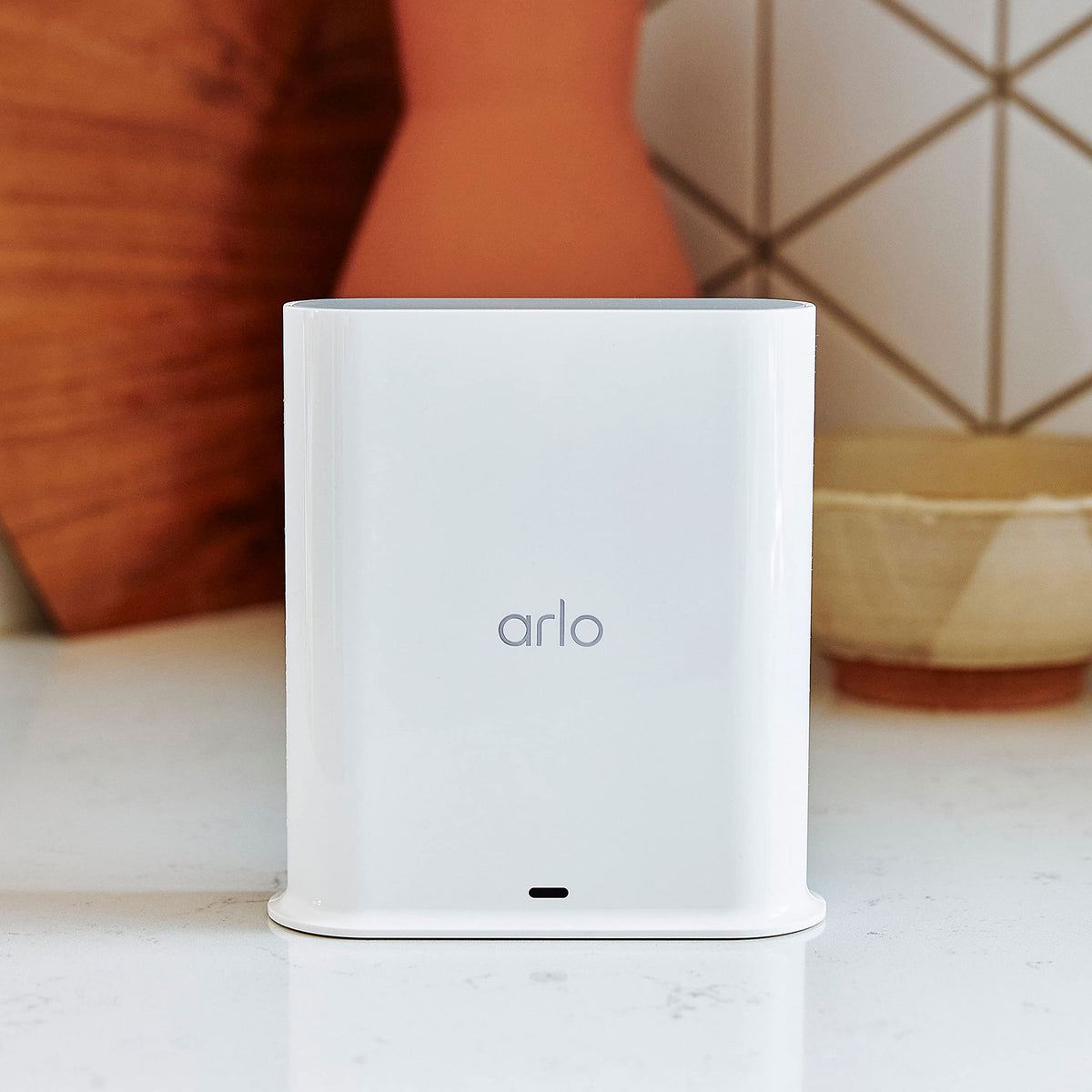 Arlo SmartHub rear ports close-up showing Ethernet and power for connection