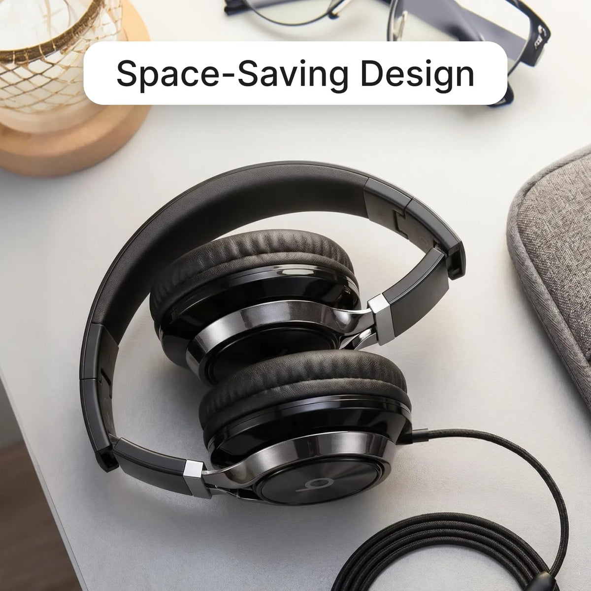 ARTIX CL750 next to smartphone showing size and portability benefit