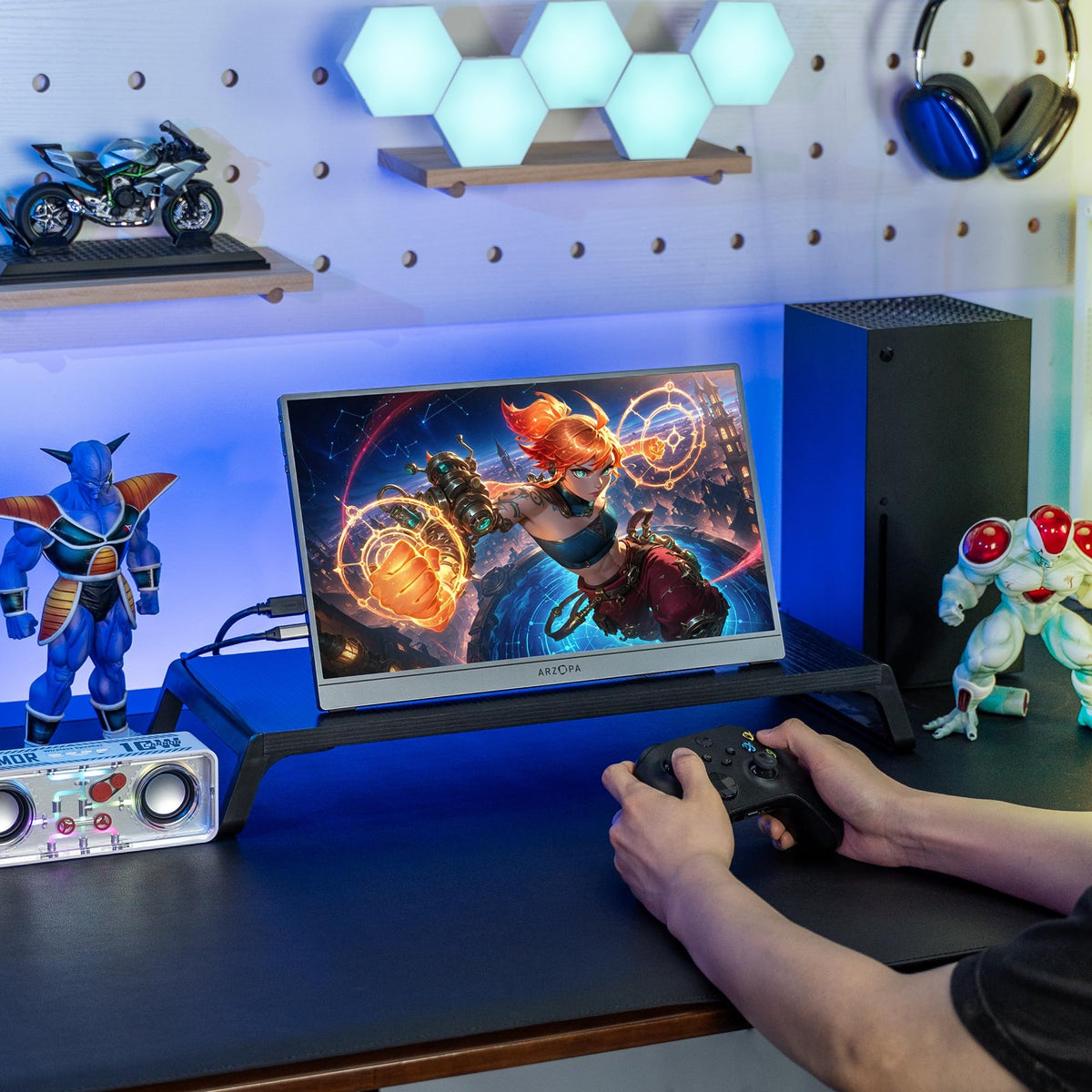 ARZOPA 16.1-inch monitor with PS5 setup on a couch.