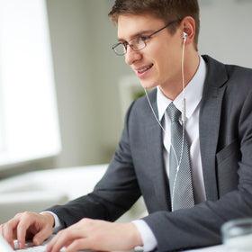ASKUBSKU headset in laptop video call showing comfortable everyday use