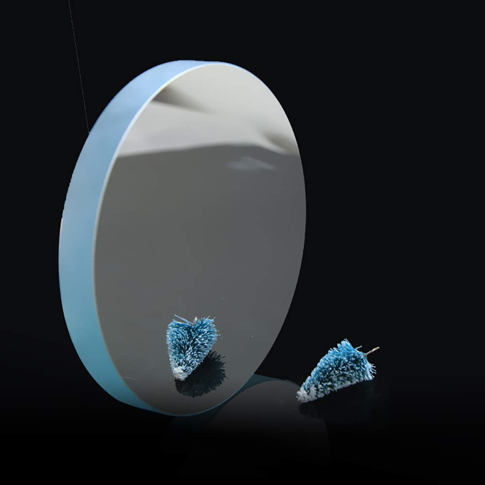 Astronomical Telescope mirror next to ruler showing 114mm diameter for accurate sizing