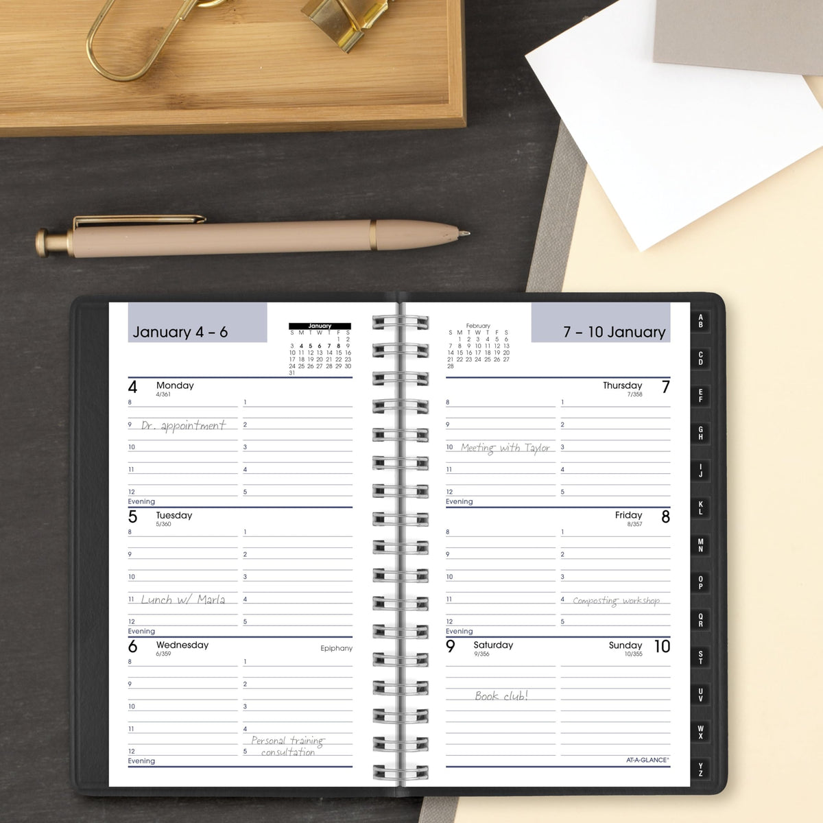 AT-A-GLANCE DayMinder weekly schedule spread enables hourly planning on weekdays.