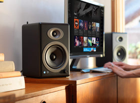 Audioengine A5+ wireless setup highlighting AptX-HD Bluetooth connection.