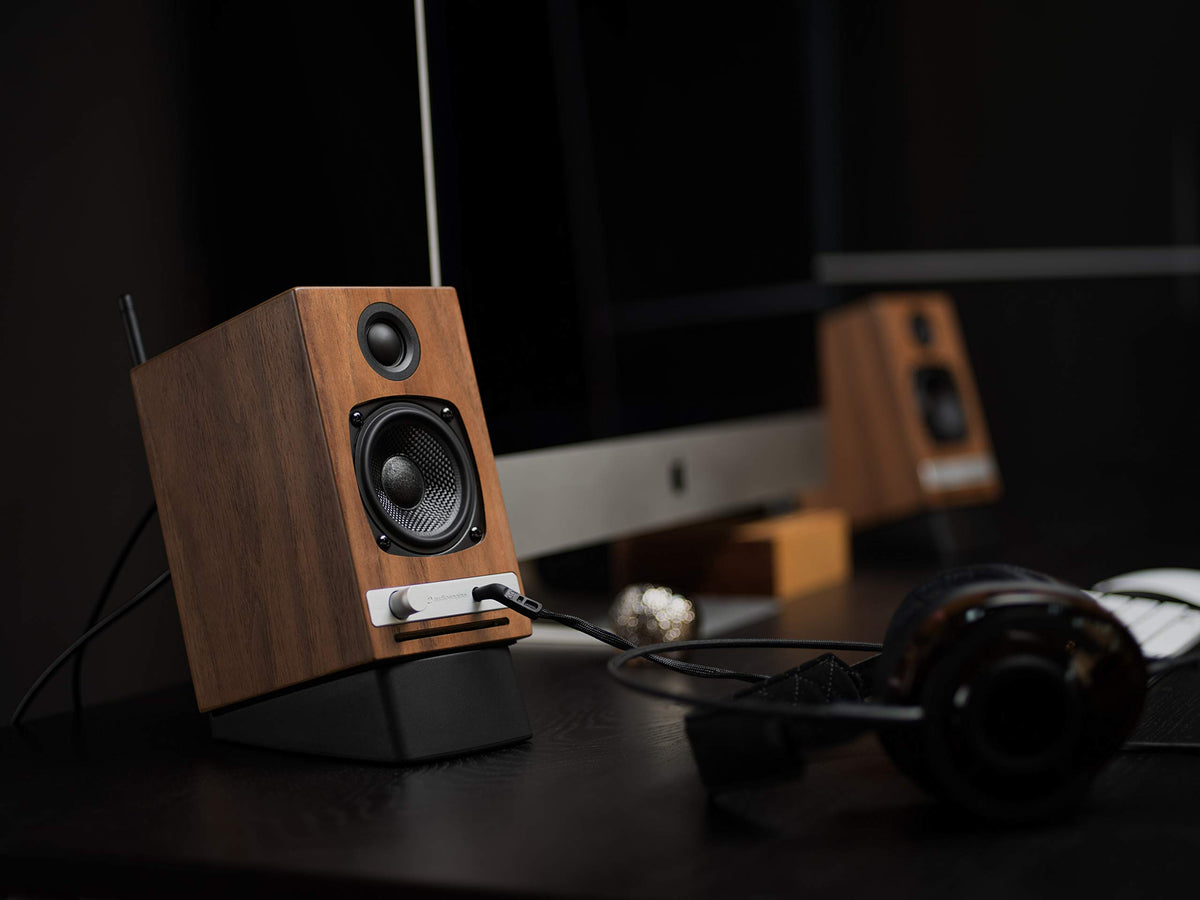 Audioengine DS1 next to ruler showing scale and compact size for desktop setups