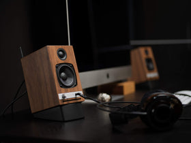 Audioengine DS1 next to ruler showing scale and compact size for desktop setups