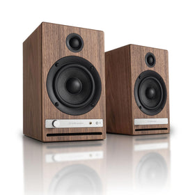 Audioengine HD4 wood cabinet close-up showcases craftsmanship and premium finish for desks.
