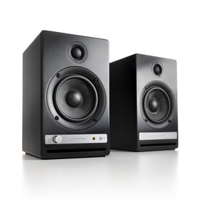 Audioengine HD4 wood cabinet with real veneer and refined build.