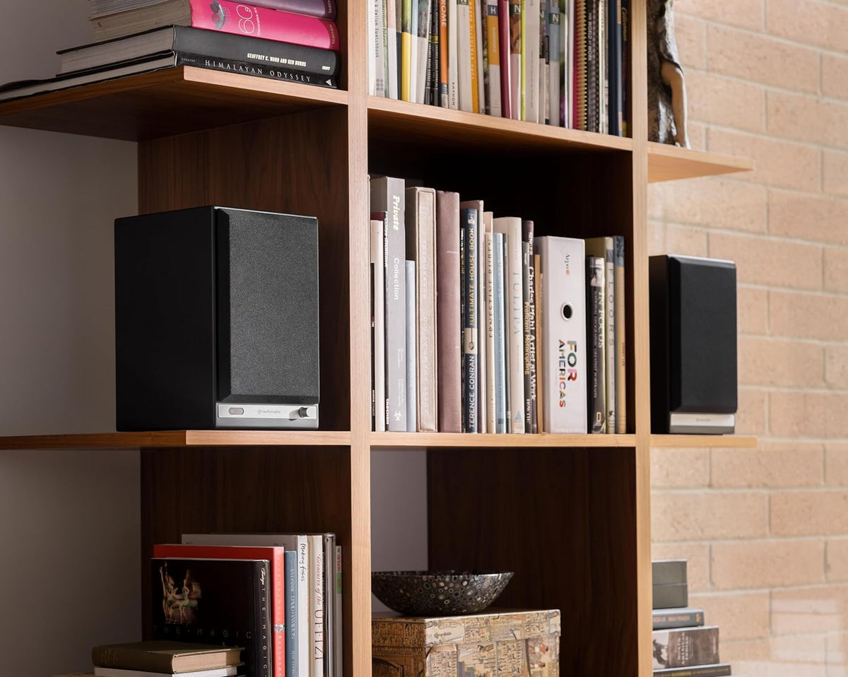 Audioengine HD5 real wood veneer cabinet in walnut finish adds warm aesthetics.