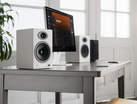 Audioengine HD5 real wood veneer cabinet enhances room aesthetics.
