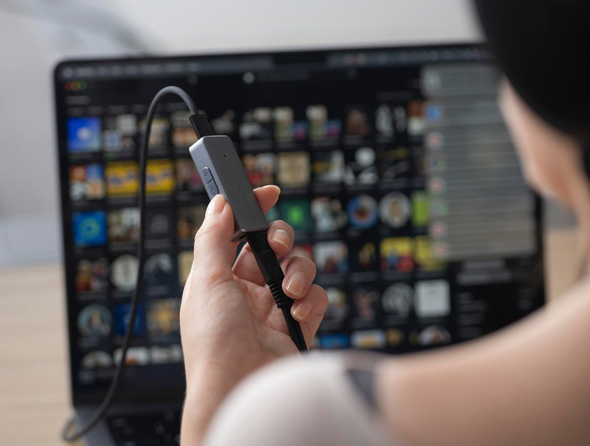 4-4mm and 3-5mm outputs offer flexible headphone setups on desk