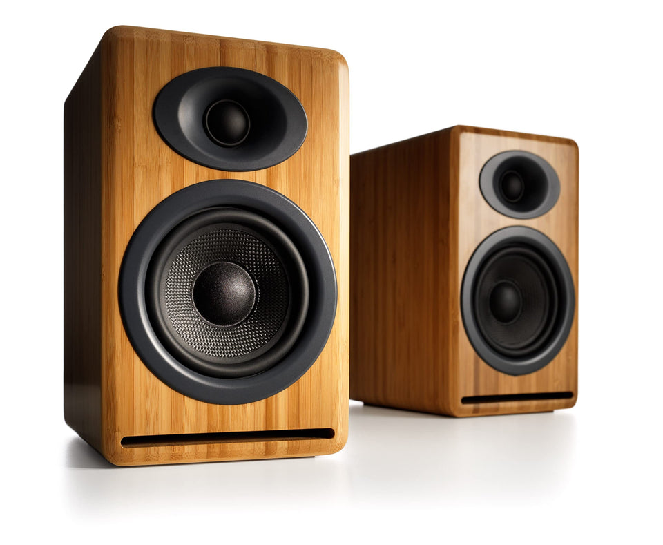 Audioengine P4 bamboo front-port design enhances bass control in compact spaces.