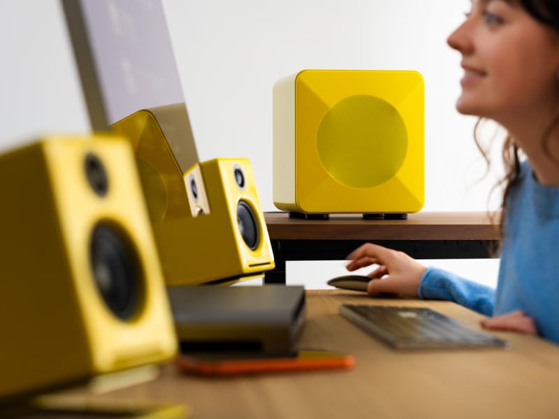 Audioengine S6 premium high-gloss yellow finish adds stylish vibe to living room