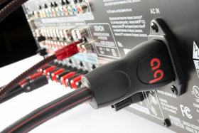 AudioQuest NRG-X3 detail shows direction-controlled conductors and noise-dissipation.