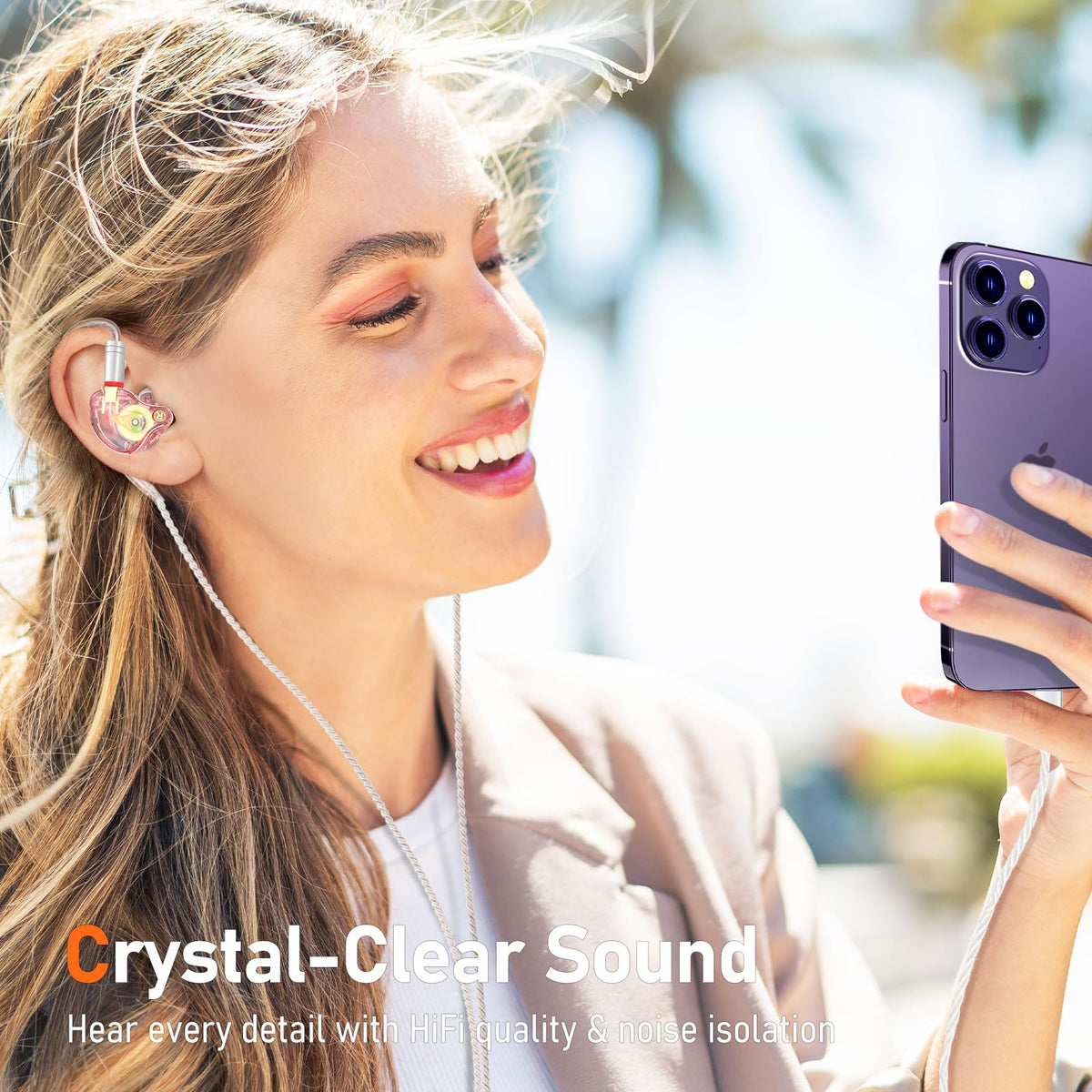 Audiovance earbuds beside coin showing compact size and portability