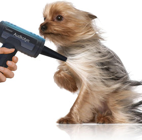 Audkotyn air blower cleaning a keyboard for dust-free surfaces.