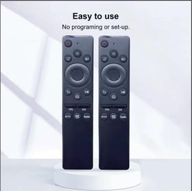 AUSOTUSO Pack-2 remote on a living room TV stand.