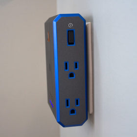 Austere V Series in-office desk setup with four outlets in use