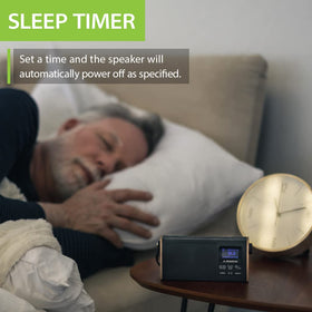 Avantree Soundbyte T on a bedside table with morning scene, great for hands-free listening