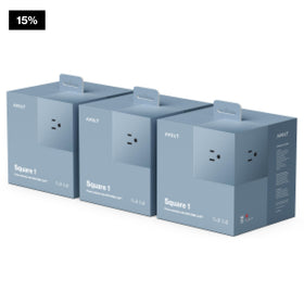 AVOLT Square 1 with 3 outlets powering a laptop, monitor, and lamp