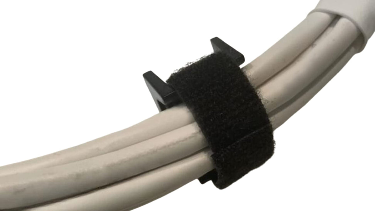 Generic cable tie mount in a rack setup keeps AV and telecom cabling neat.