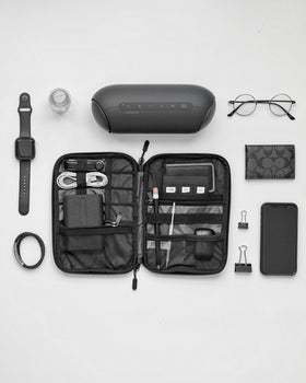 BAGSMART grey organizer on a desk with phone and power bank