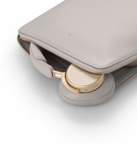 Beoplay H100 frosted glass surface adds refined touch and feedback.