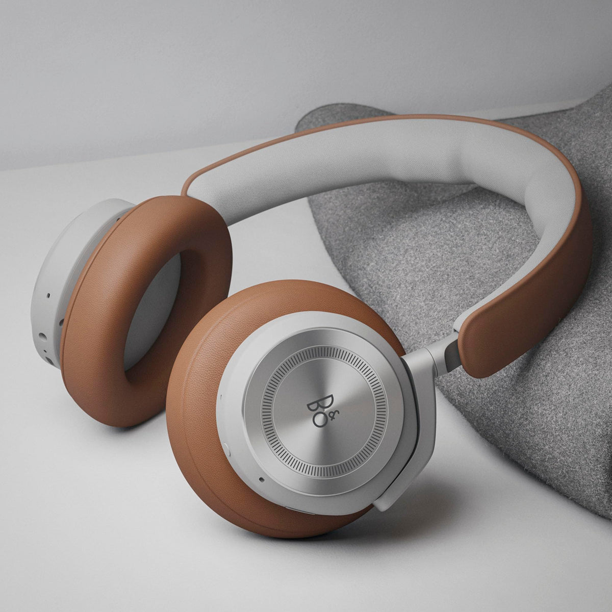 Beoplay HX hybrid ANC technology reducing ambient noise for focused listening