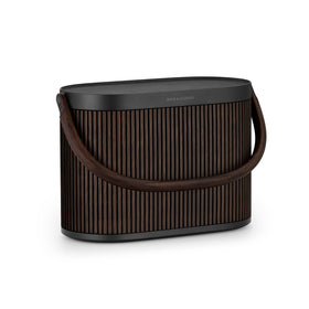 Bang & Olufsen Beosound A5 with wooden handle design makes transport effortless indoors and outside.