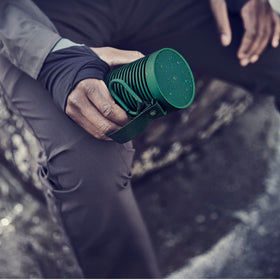 360-degree grill design delivering balanced omnidirectional sound from Beosound Explore.