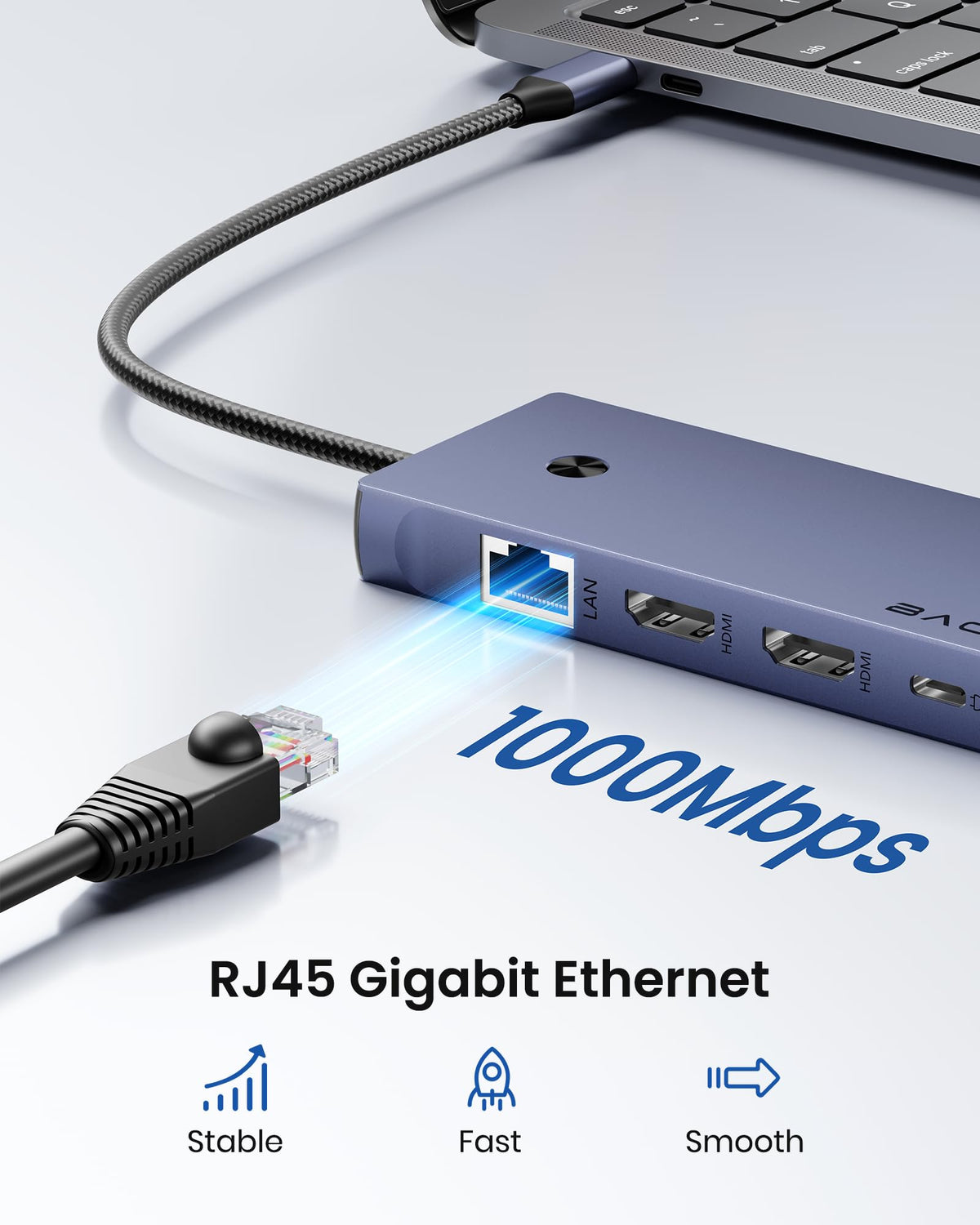 BAOZEE dock plugged into MacBook in a home office to simplify connections